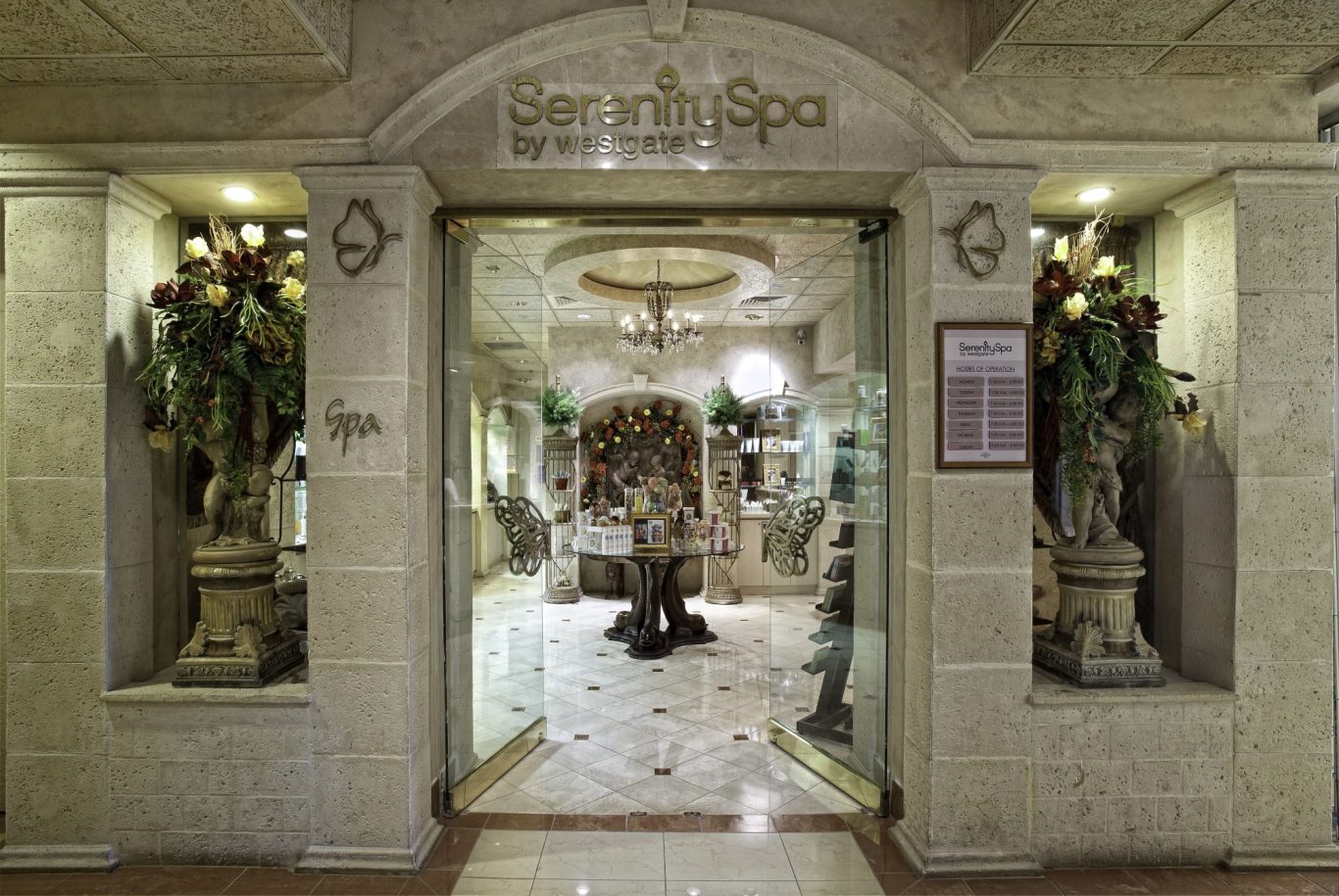 Entrance to a luxurious spa with ornate decor and elegant furnishings.